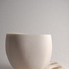Off Circle Cup and Bone Saucer