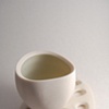 Off Circle Cup and Bone Saucer