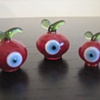 Glass evil eye figurines