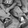 Boy Sleeping On Market Floor