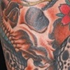 skull and snake tattoo