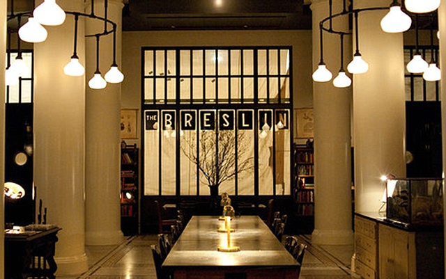 Ace Hotel 
Blown glass covers for chandeliers surrounding columns in lobby 
Roman and Williams, Argosy Designs, and GFI Capitol 
Resources.
