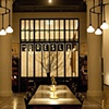 Ace Hotel 
Blown glass covers for chandeliers surrounding columns in lobby 
Roman and Williams, Argosy Designs, and GFI Capitol 
Resources.
