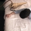 On the bed...