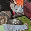 Working on Cars at Night.