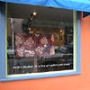 Merket Flowers in Window of MOXY Studios