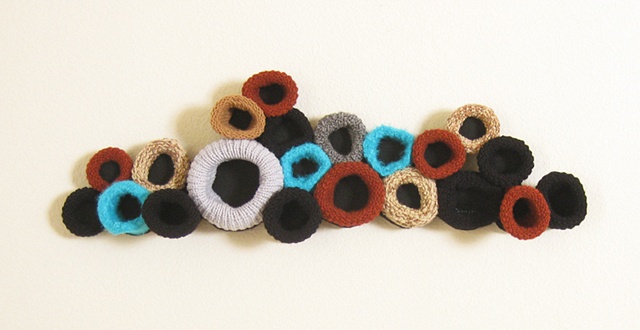"Uneven Endings" is a felted mixed media piece of contemporary fiber art by Linda Thiemann.