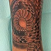 chris collinsworth white lotus tattoos denver co