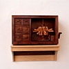 Cabinet with Orbiting Objects
