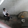 Migrant worker at home, Red Dragon Village, Guangzhou, South China