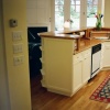 Full overlay cabinets with  highly figured cherry counter tops