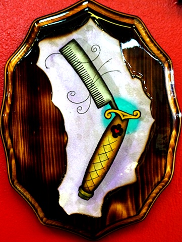 switchblade comb