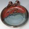 Brie Baker, cayenne and blue, with glaze leaf design