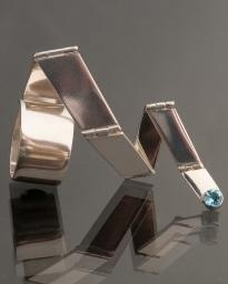 Anika Smulovitz body in motion jewelry hinged ring silver
