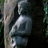Girl with frog statue, gift from JJJP garden.