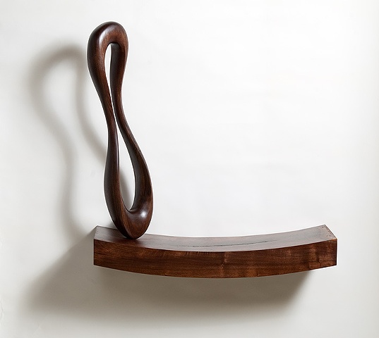 Solid walnut shelf with sculptural element