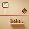 Bottlecap Economics with collages, installation view