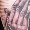 praying hands tattoo