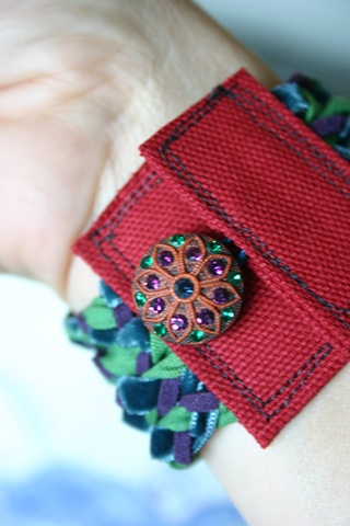 Braided cuff in blue, green, purple