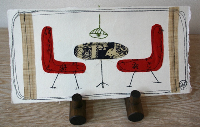 A table and 2 chairs