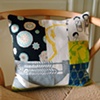 Yellow and black pillow
