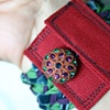 Braided cuff in blue, green, purple