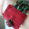 Braided cuff in green and brown