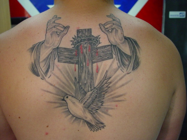 Cross looks bent because of dip in back.
