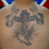 Cross looks bent because of dip in back.