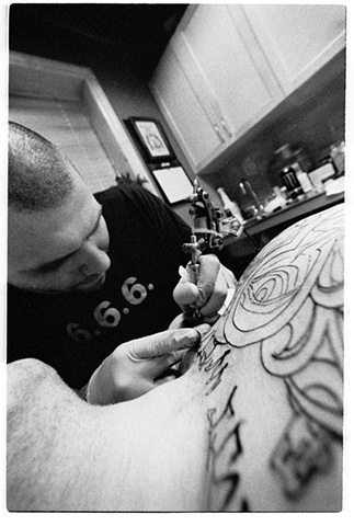 Justin Lipuma tattooing my chest at Lost City