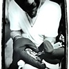 Justin Lipuma tattooing my arm