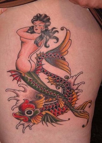 an old Sailor Jerry Design on a hip/thigh of my beloved Cara.