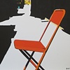 orange chair in alley
