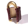 SIGNATURE SNAKESKIN CUFF
Wine