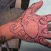 Octopus tattoo drawing during cover up process