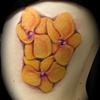 Flower rib tattoo
