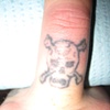 Finger tattoo before cover up