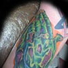 praying zombie hand tattoo