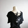 the songbird capelet dress.