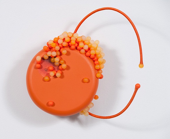 untitled lure (orange with cords)
