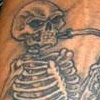 skeleton playing a saxaphone tattoo