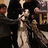 2 T-Rex Marionettes having fun