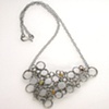 Cellular Necklace. Oxidized ss with peridot, garnet, and citrine set in 14kt bezels.