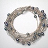 Muti Strand Bracelet. SS and freshwater pearls