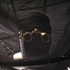 Opera glasses mask. 
Part of slide robe and satellite installation 