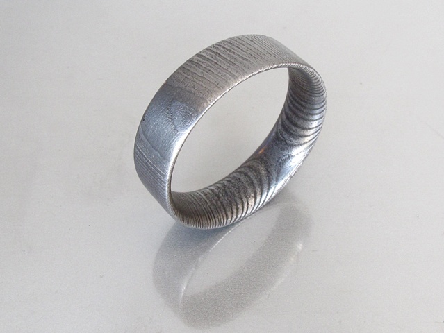 Damascus steel wedding band