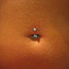 navel Piercing with Faceted Gem Barbell 