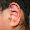 rook & Tragus Piercing