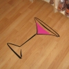 martini glass on floor