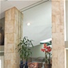 Textured faux travertine and mosaic